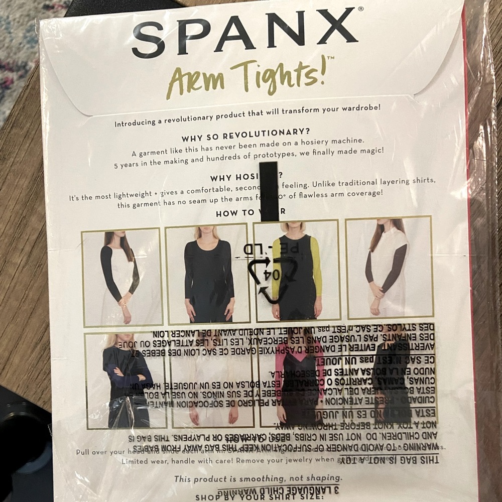 Never opened, never worn, Spanx arm tights